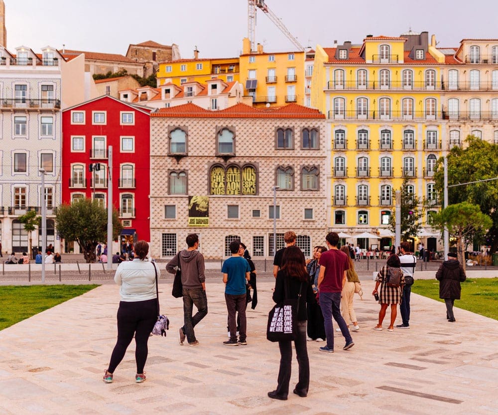 Tourists gathered while sightseeing in Lisbon on vacation