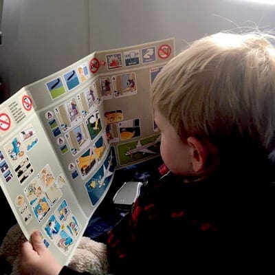 Best U.S. airlines children reading brochure