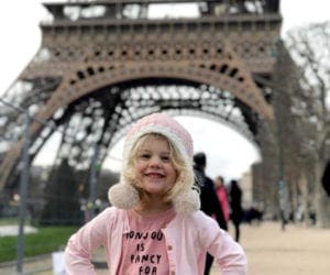 Girl in front of Eiffel Tower