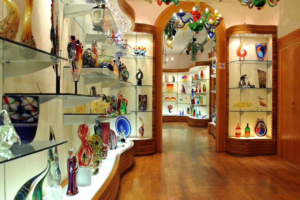 A store selling handmade glass in Murano, Venice, one of the best places to visit on an Italy itinerary with kids. 