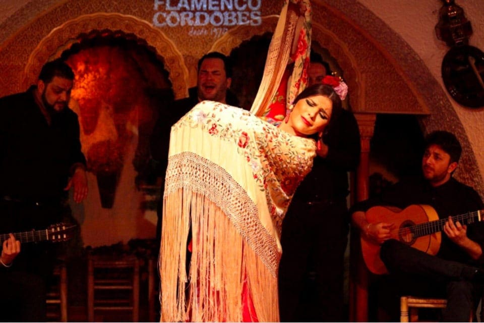 A woman dances a traditional Spanish dance at the Tablao Flamenco Cordobés.