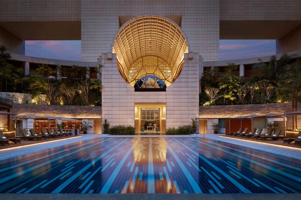 The indoor pool at The Ritz-Carlton, Millenia Singapore, on of the best places to stay in Singapore with kids.