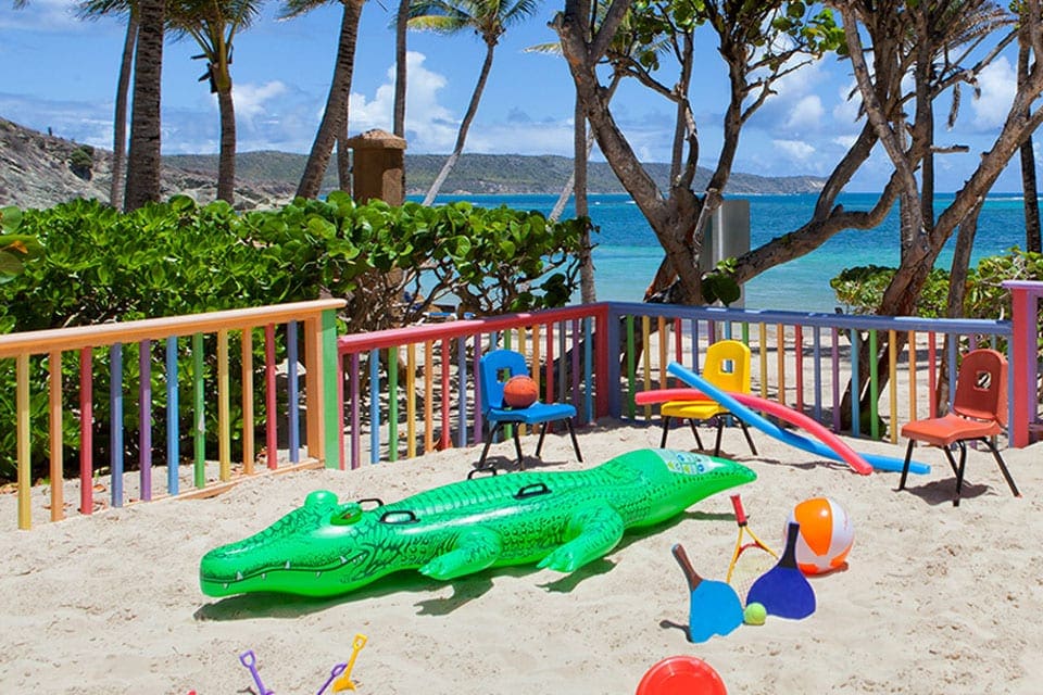 The kids club at the St. James Club & Villas Antigua, one of the best family resorts in Antigua, is a spacious place which has both an indoor as well as an outdoor play area. the outdoor play area has a sand pit as well.
