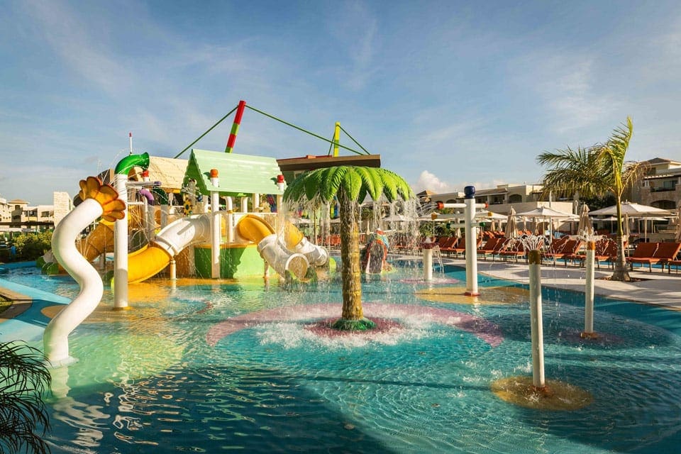 The waterpark at Moon Palace The Grand - Cancun, featuring fun areas to splash, a large slide, and plenty of fun places to play.