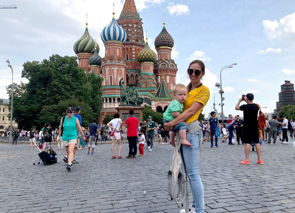 Mom and daughter stand in front of The Cathedral of St. Basil in Moscow. This is one of the most important stops on our virtual travels to monuments around the world.