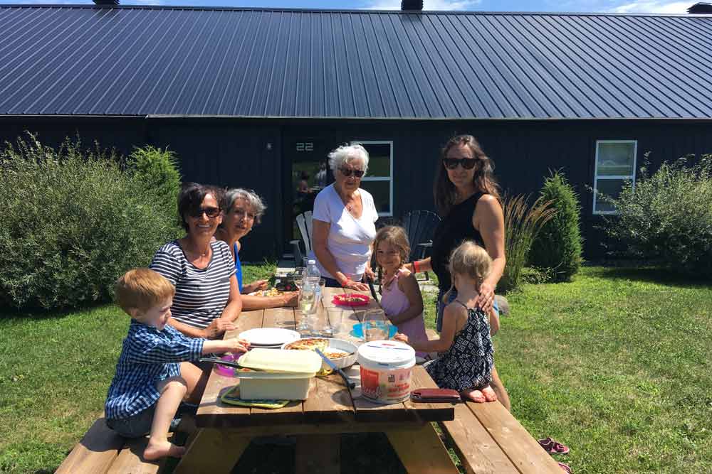 Family enjoying picnic in Quebec, Canada