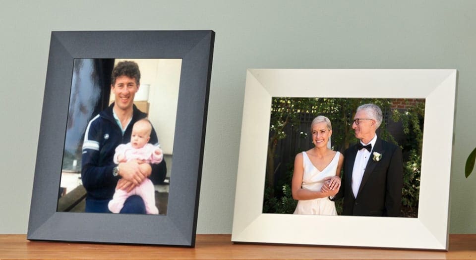 2 Digital Frames with photos of family