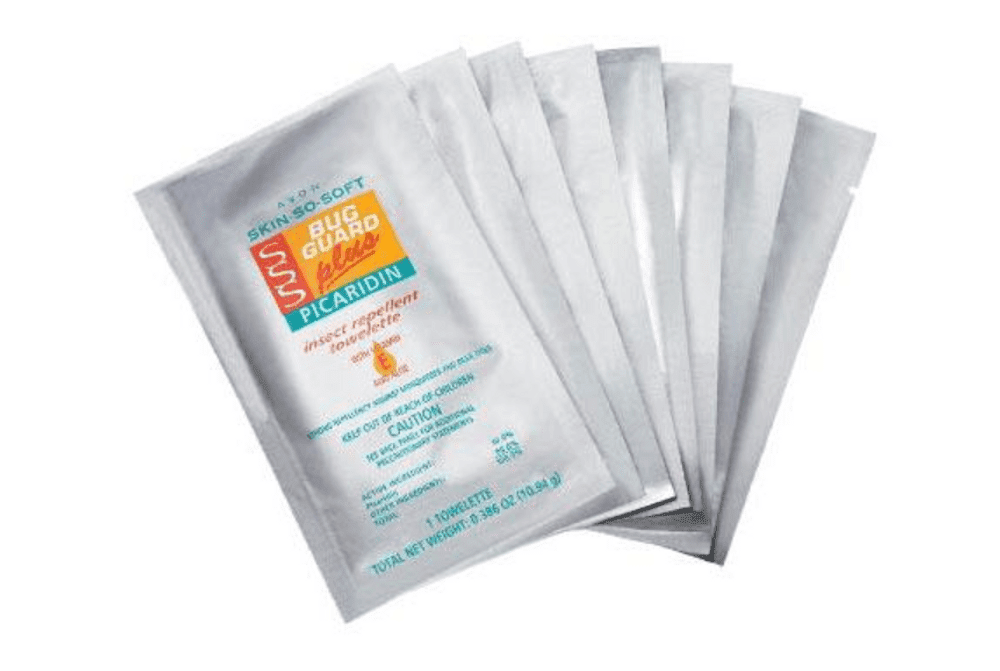 Eight packets of Avon Bug Guard wipes are fanned out in an arch. Wipes are one of the best alternatives to bug spray.