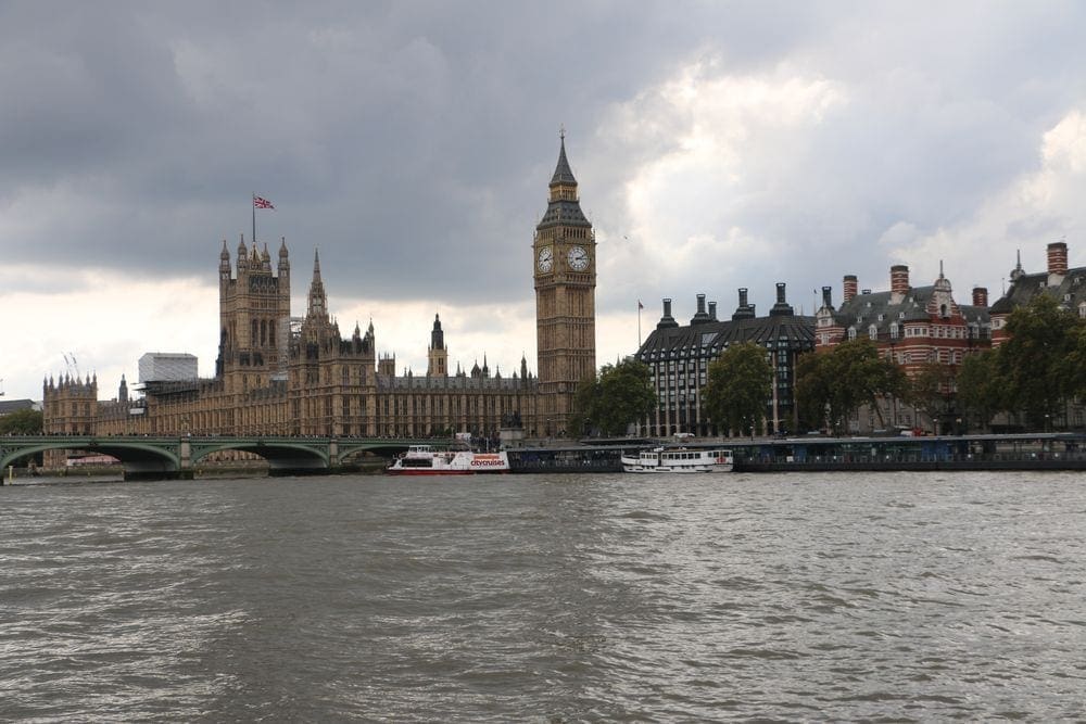 A view of Westminster and Big Ben across the Thames River.