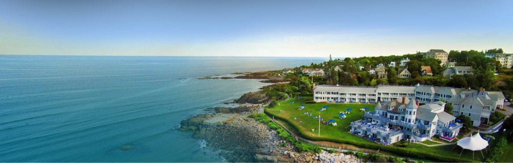 An aerial view of Beachmere Inn, along the rocky coast of Maine.