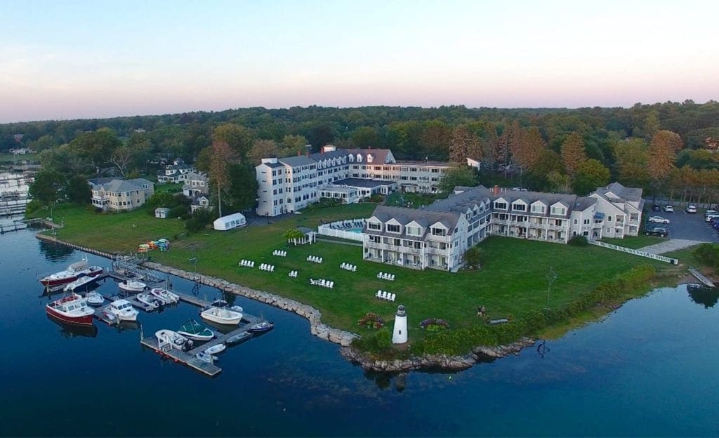 Aerial view of The Nonantum Resort right before sunset on a crisp autumn day at one of the best Maine hotels for families.