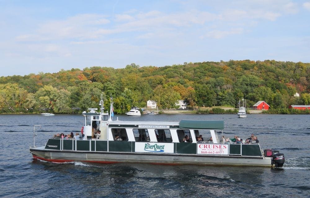 The RiverQuest sails through a Connecticut river on a fall afternoon.