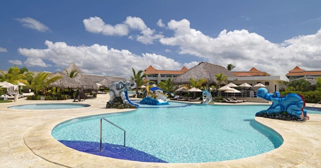 A view of the pool and cabana at The Reserve At Paradisus Palma Real, one of the best Caribbean resorts with baby clubs..