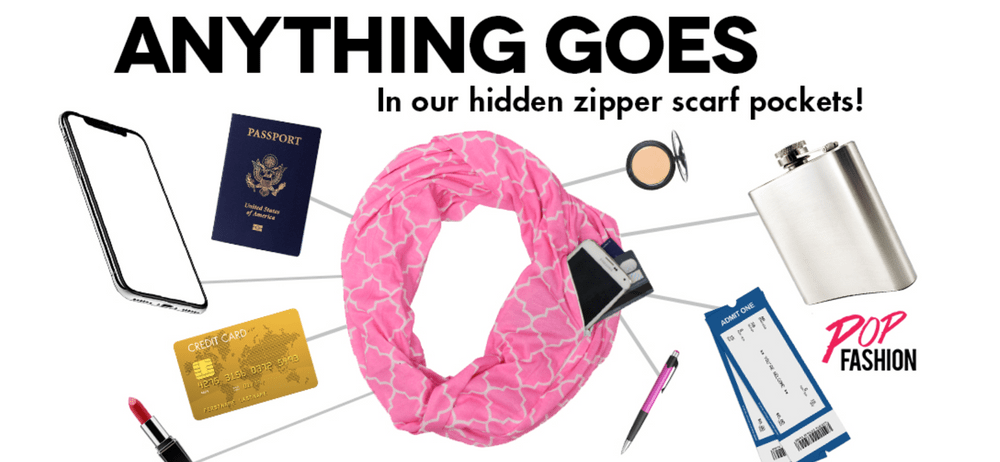 A large pink scarf sits in the middle of a nubmer of travel objects, like passports, lipstick, phones, and creditcards, with the following words above the image, "Anthing Goes In our hidden zipper scarf pockets!".