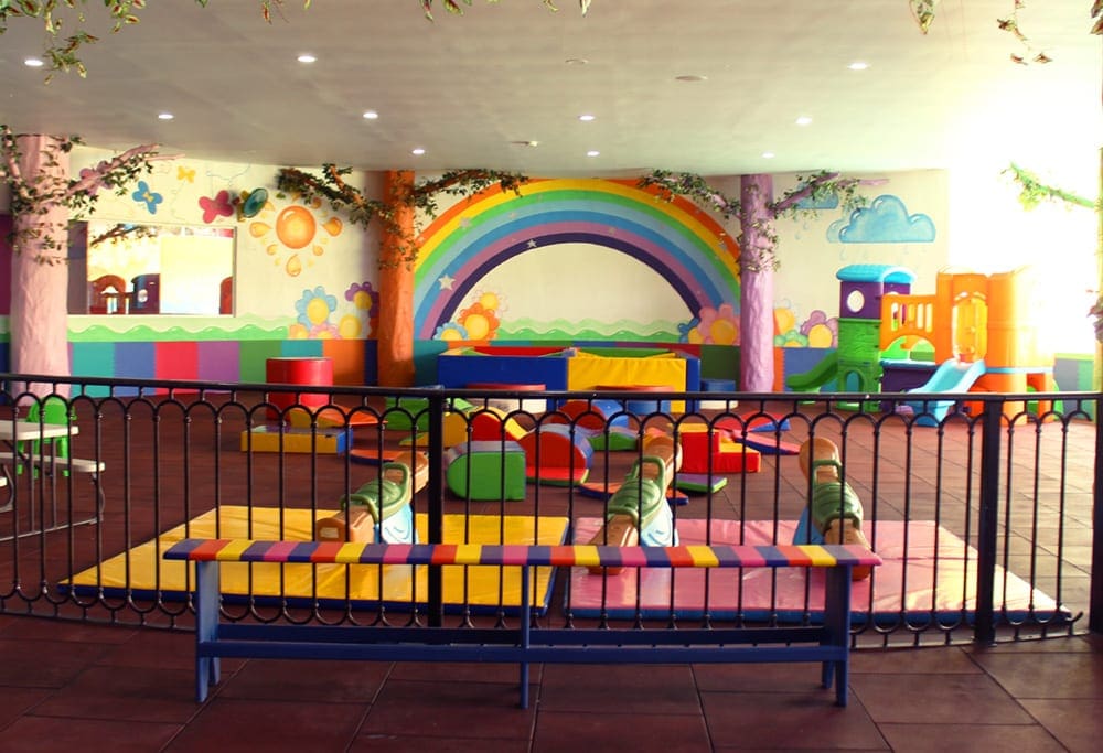 Inside the baby club at Photo Courtesy: Seadust Cancun Family Resort, featuring bright colors and exciting toys.