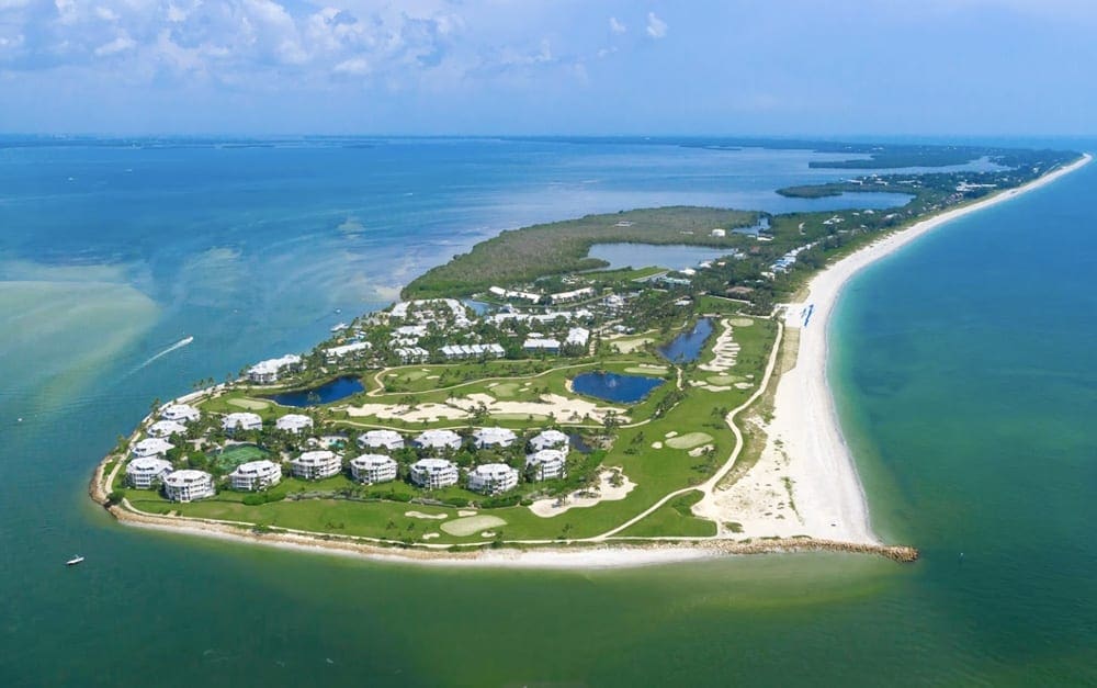 An aerial view of South Seas Resort, one of the best family resorts in Florida, surrounded by water on all sides.