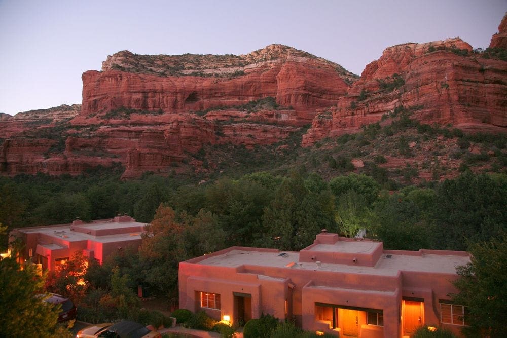 Sedona's red rocks rise in the background of the Enchantment Resort, one of the best hotels in Sedona for families.