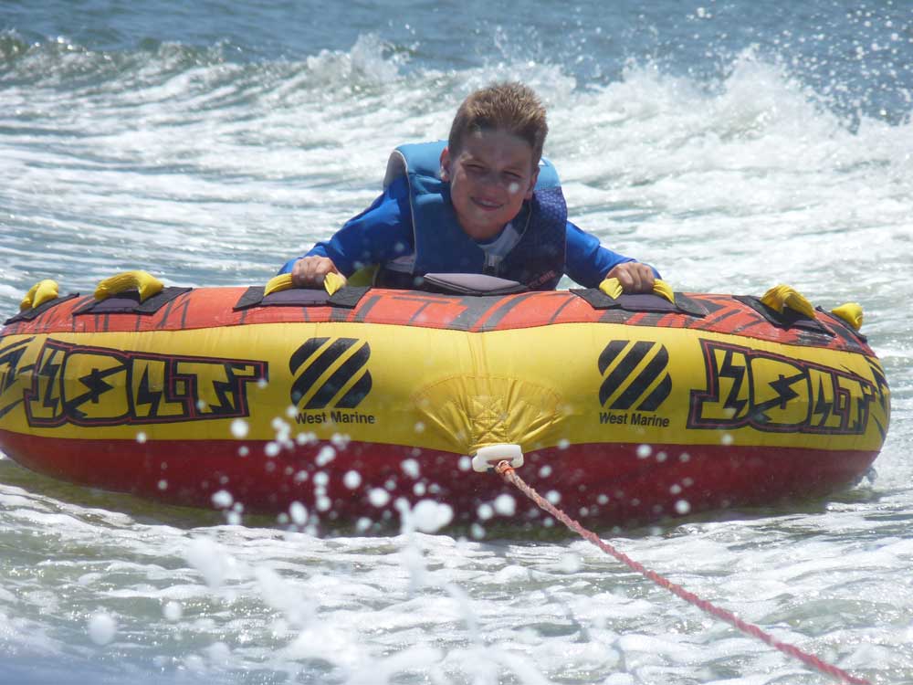 Boy water tubing in Hilton Head South Carolina, one of the best spring break family destinations!