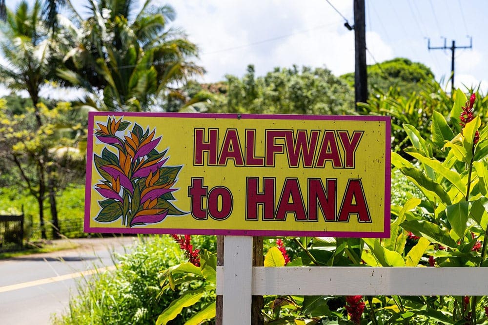 Road sign saying Halfway Road to Hanna Maui