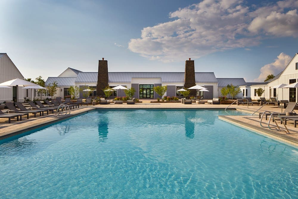 The large pool on a sunny day on the grounds of Miraval Berkshires Resort & Spa.