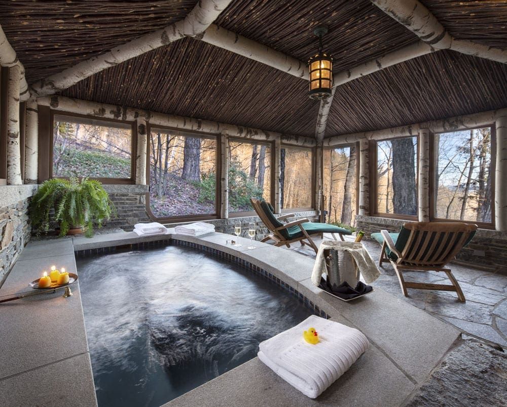 The chic whirlpool with seating area at Twin Farms, one of the best locations for a romantic getaway in the Northeast.