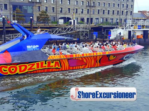 Several tourists ride a large ship in Boston Harbor with Shore Excursioneer, one of the best things to do in Boston with kids.