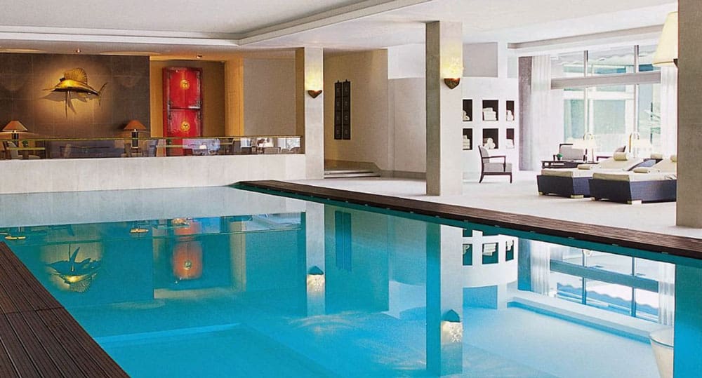 The fresh, clean indoor pool at the Four Seasons Hotel Ritz Lisbon, one of the best Lisbon hotels for families.