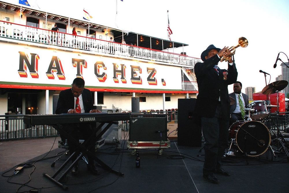A band plays for guests aboard the Steamboat NATCHEZ.