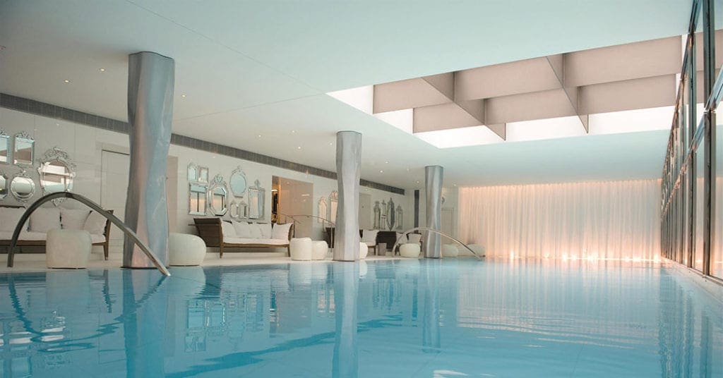 The beautiful indoor pool at the Hotel Le Royal Monceau – Raffles Paris, one of the best Paris hotels for families.