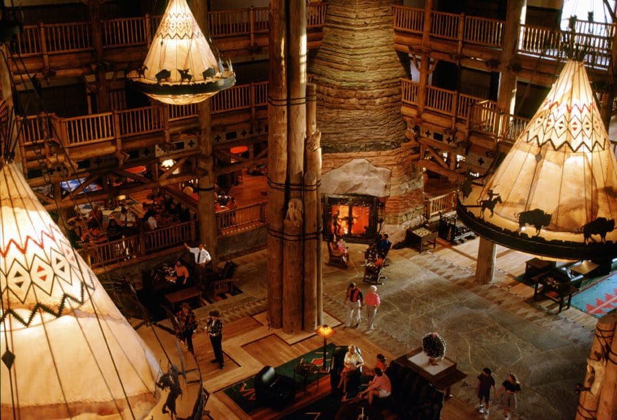 Inside the entrance lobby at the Disney Wilderness Lodge, featuring rustic furnishings and design.