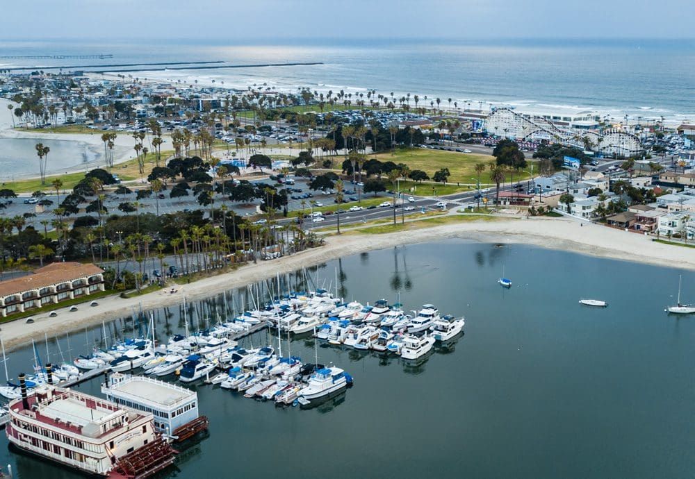 An aerial view of the beach and marina on the grounds of the Bahia Resort Hotel.