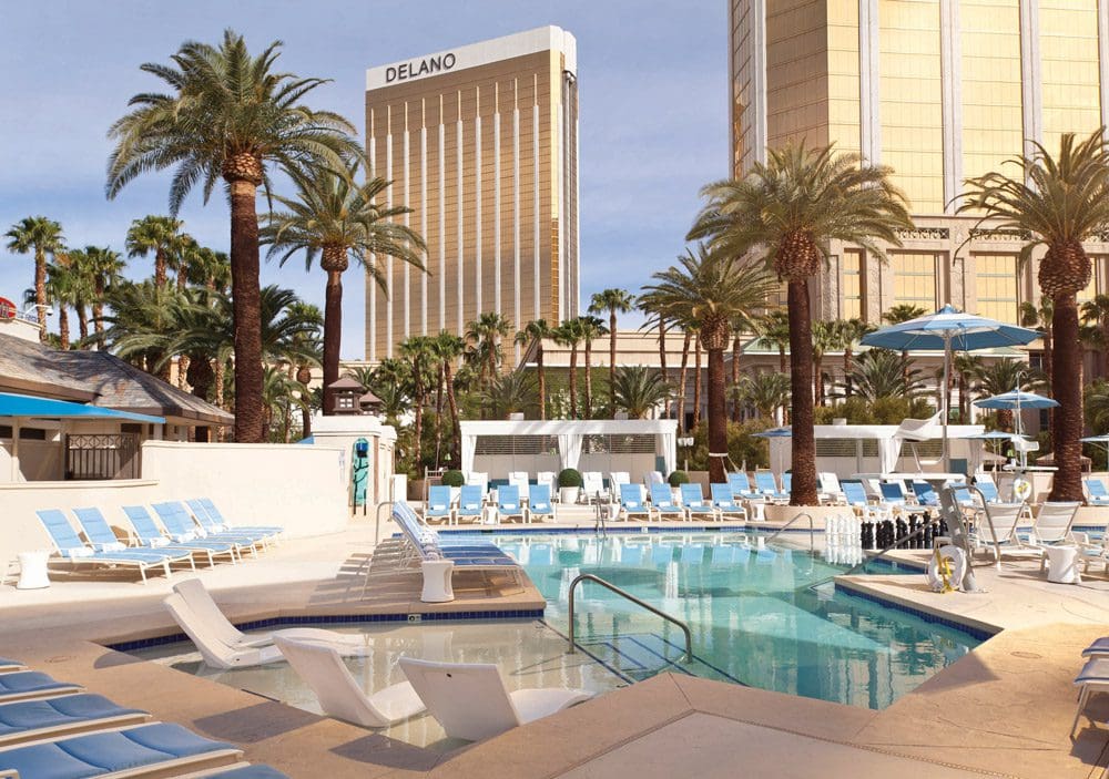 The outdoor pool at Mandalay Bay with a clear view of the Delano in the distance.