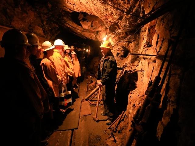 A tour guide leads families in a tour of the Country Boy Mine near Breckenridge.