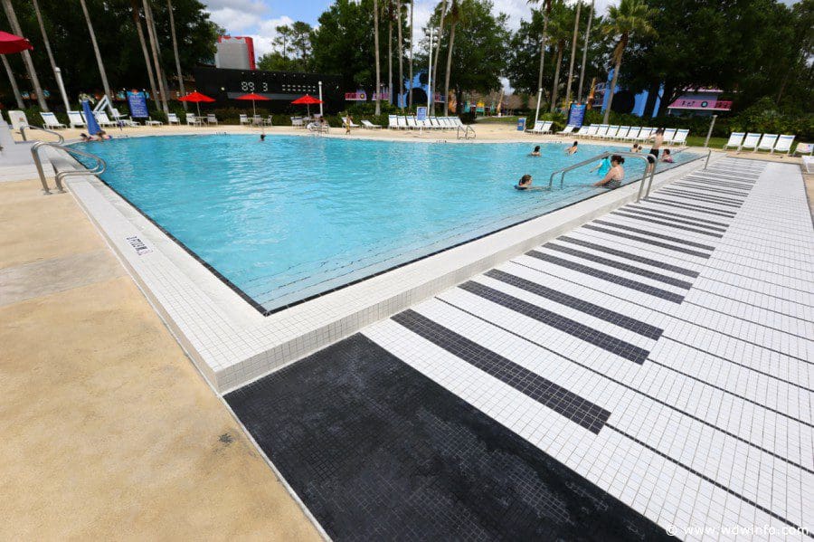 The pool at Disney’s All-Star Music Resort. One side flanking the pool looks like a keyboard.