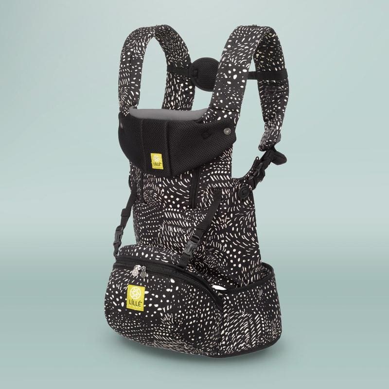 A product shot of a black and white speckled Lillebaby SeatMe All-Seasons Carrier.
