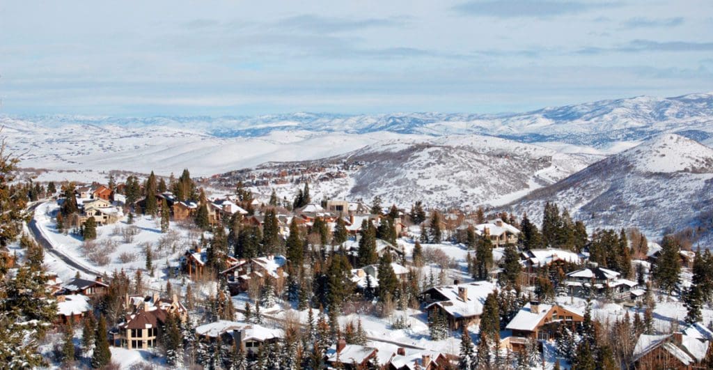 An aerial view of the Deer Valley Ski Resort filled with snow at one of the best ski resorts in the United States for families.