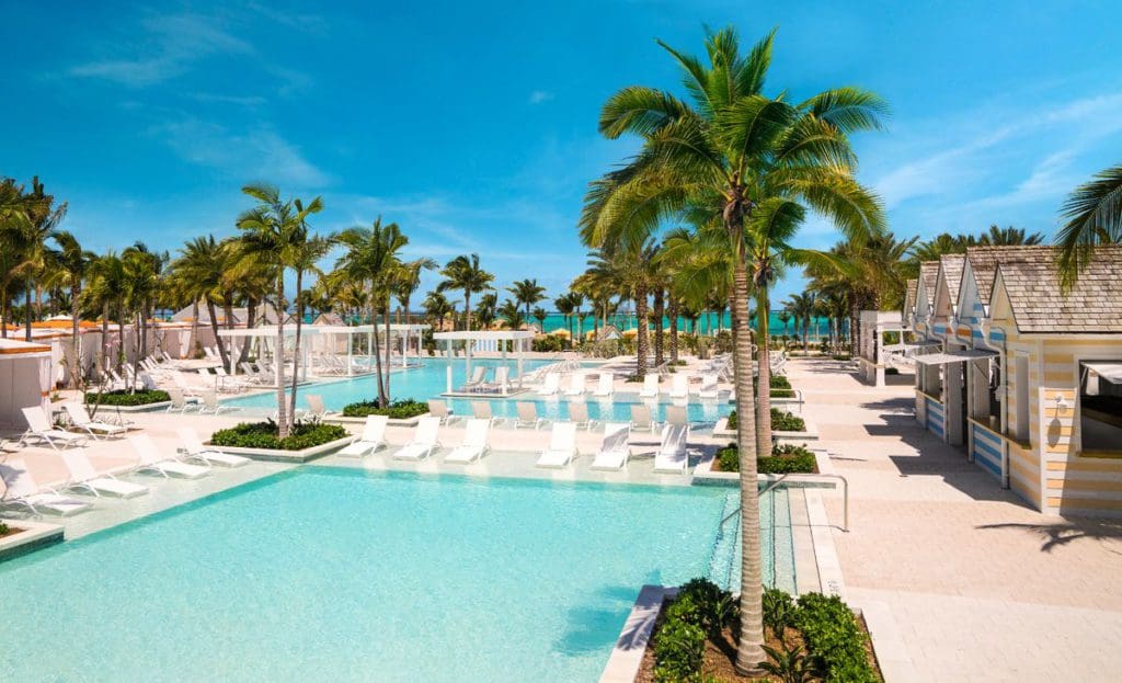 The pool and surrounding pool deck with loungers at the Photo Courtesy: Grand Hyatt Baha Mar.