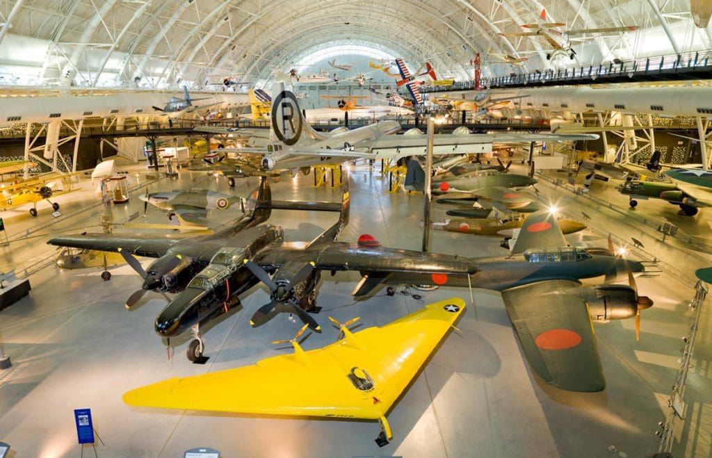 Inside one of the exhibits at the National Air and Space Museum, featuring a room filled with different kinds of planes.