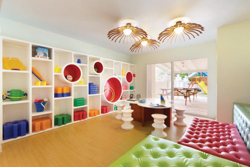 Inside the colorful kids' club at the Hyatt Ziva Rose Hall, featuring several toys and cozy places to play.