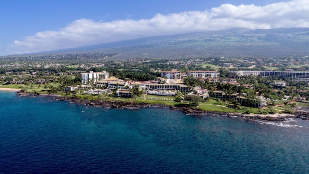 An aerial view of Wailea Beach Resort, featuring a waterfront location at one of the Best Marriott Properties in the U.S. for a Family Vacation.