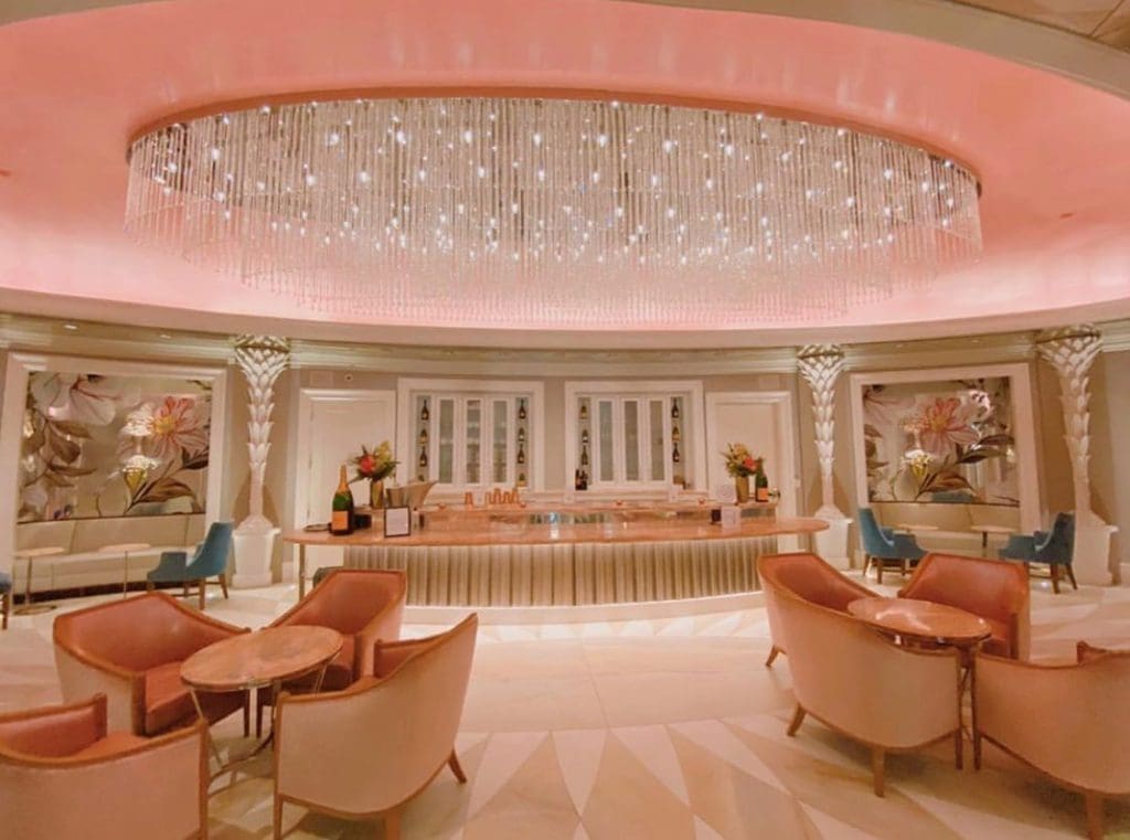 The pink lobby at Hotel Bennett, featuring pink furnishings, pink carpet, and a pink ceiling.