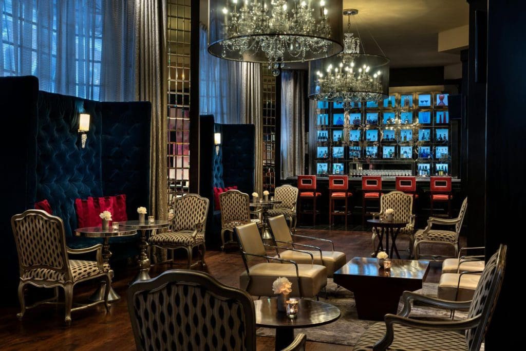Inside the dark, masculine-style den at The Ritz-Carlton, Atlanta.
