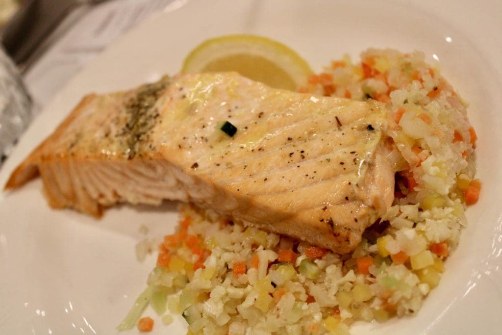 A dinner plate at Woodloch Resort, with salmon and rice pilaf.