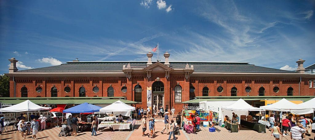 The Eastern Market in Washington DC, busy with vendors and shoppers.