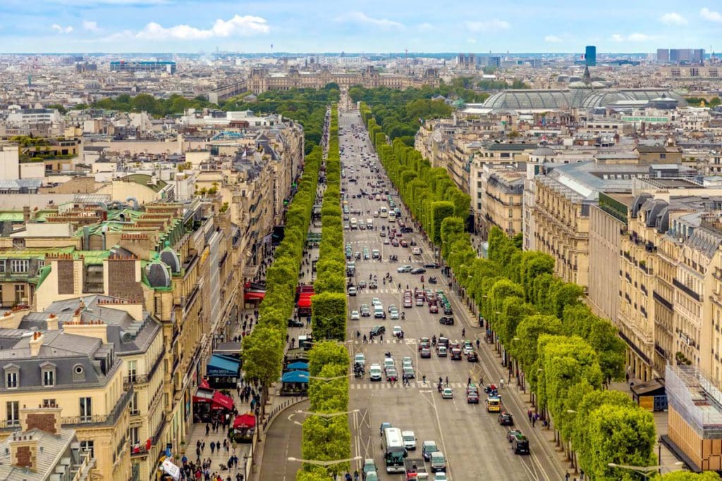 An aerial of the 8th arrondissement, with a view down a popular street, with historic buildings flanking both sides.