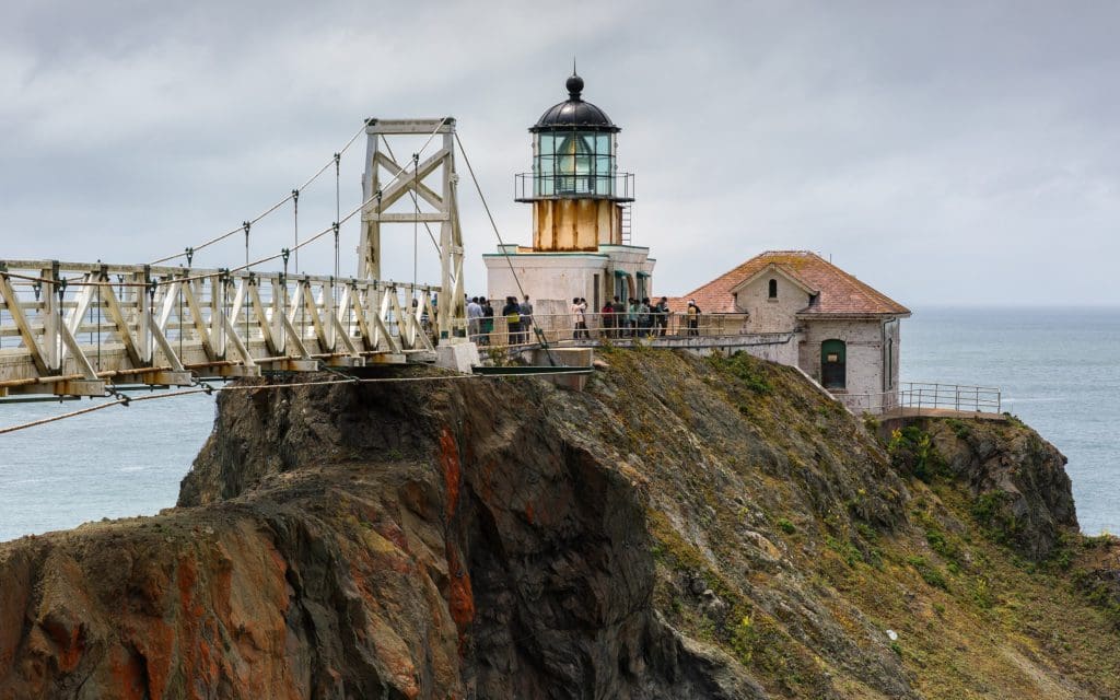 A bridge extends to the Point Bonita Lighthouse.