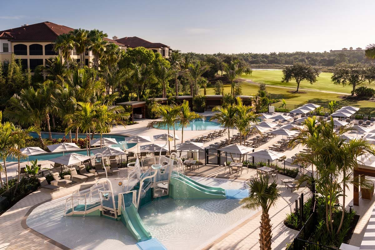 The small on-site splash pad and play area at The Ritz-Carlton Naples, Tiburón, featuring slides and water features.