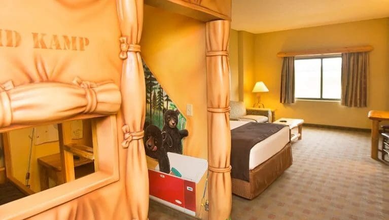 Inside one of the themed-suites at Great Wolf Lodge in Ontario, including a lovely bunk area for kids and a separate sleeping space for adults.