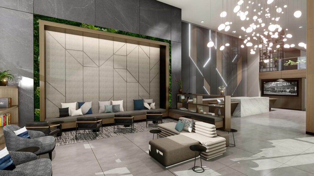 The warm indoor lobby, featuring neutral hues in the decor, at Hyatt Place Montréal – Downtown.