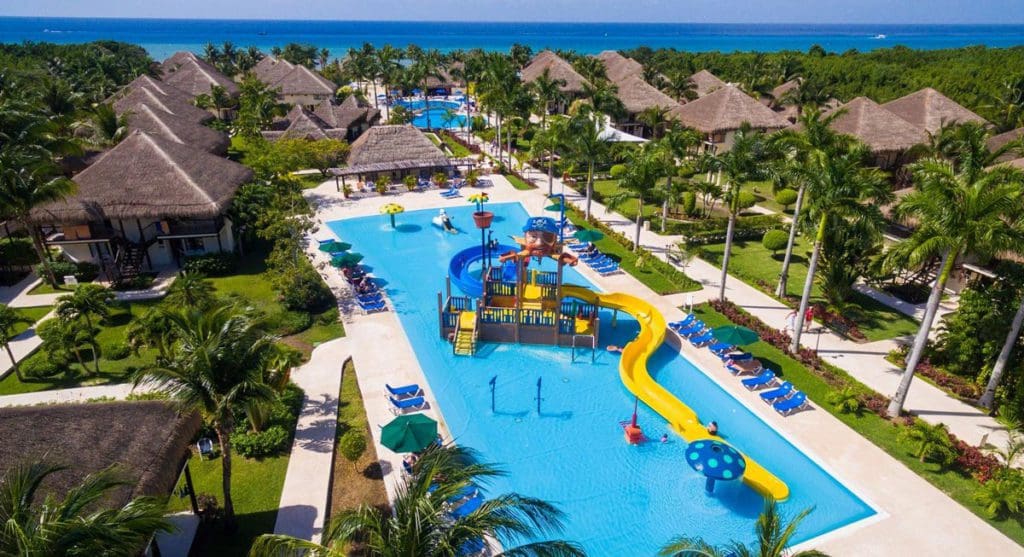 An aerial view of the large water park and surrounding pool at Allegro Cozumel.
